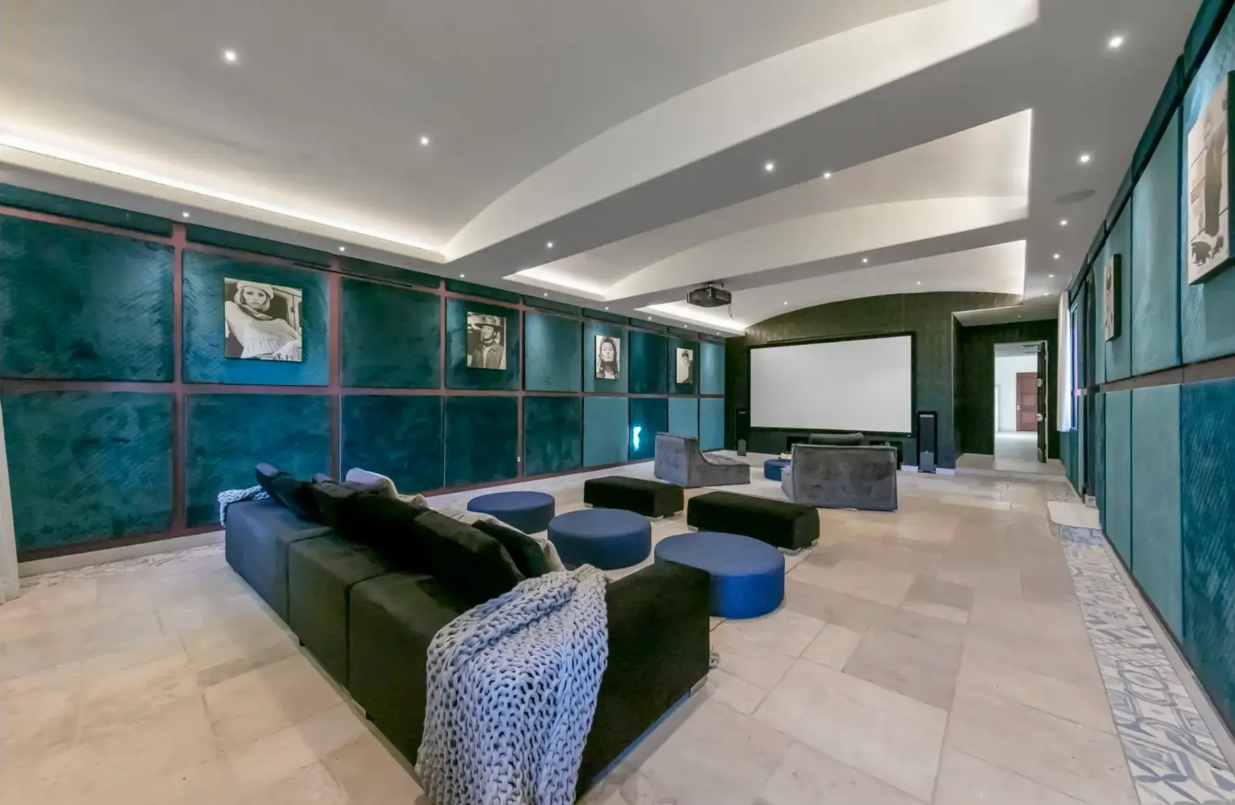 Private Wellness Lounge & Screening Room in Los Angeles Luxury Retreat Private luxury wellness lounge with theater-style seating at a Los Angeles mental health and wellness retreat