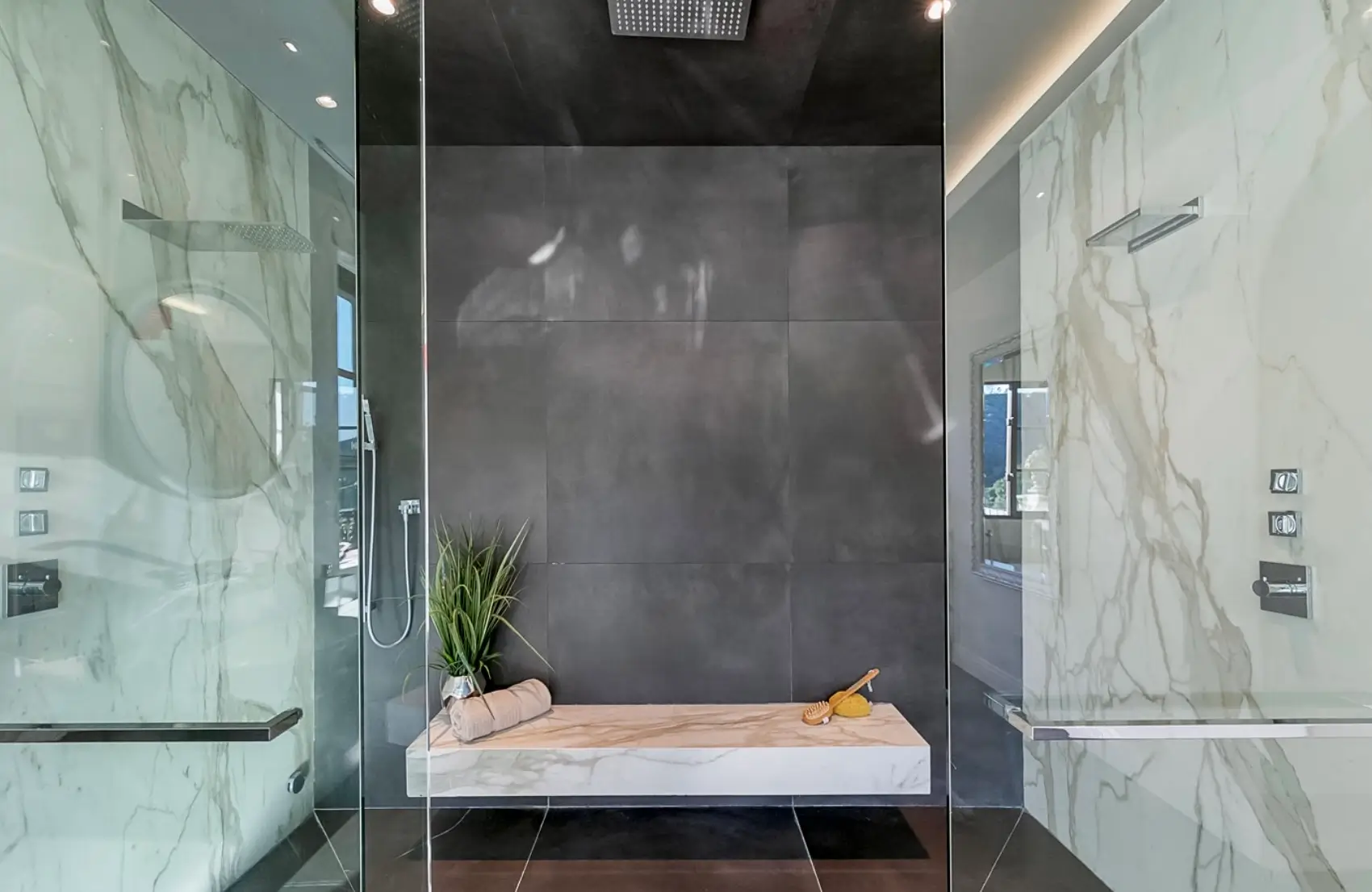 Luxury Spa-Inspired Bathroom at Los Angeles Mental Health Retreat Modern spa-style bathroom with marble walls and walk-in shower at a Los Angeles luxury mental health and wellness retreat