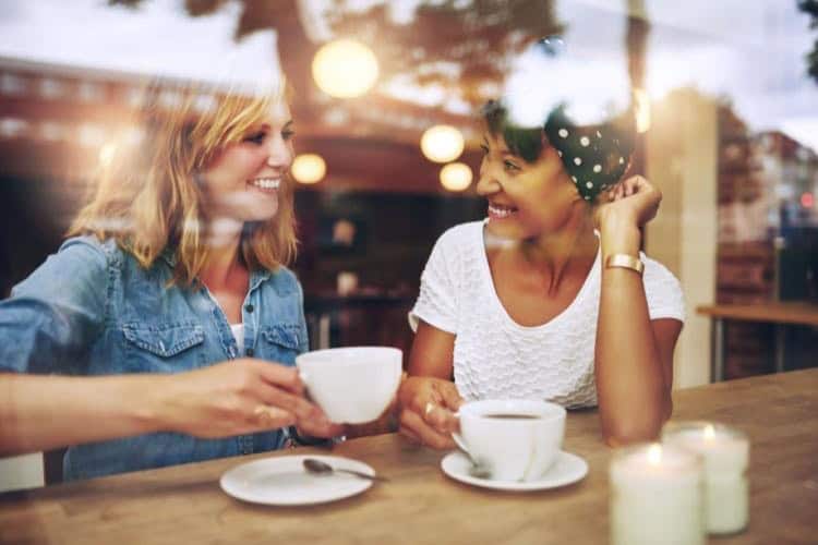 Sober Community of Support Two sober women enjoy a cup of coffee together