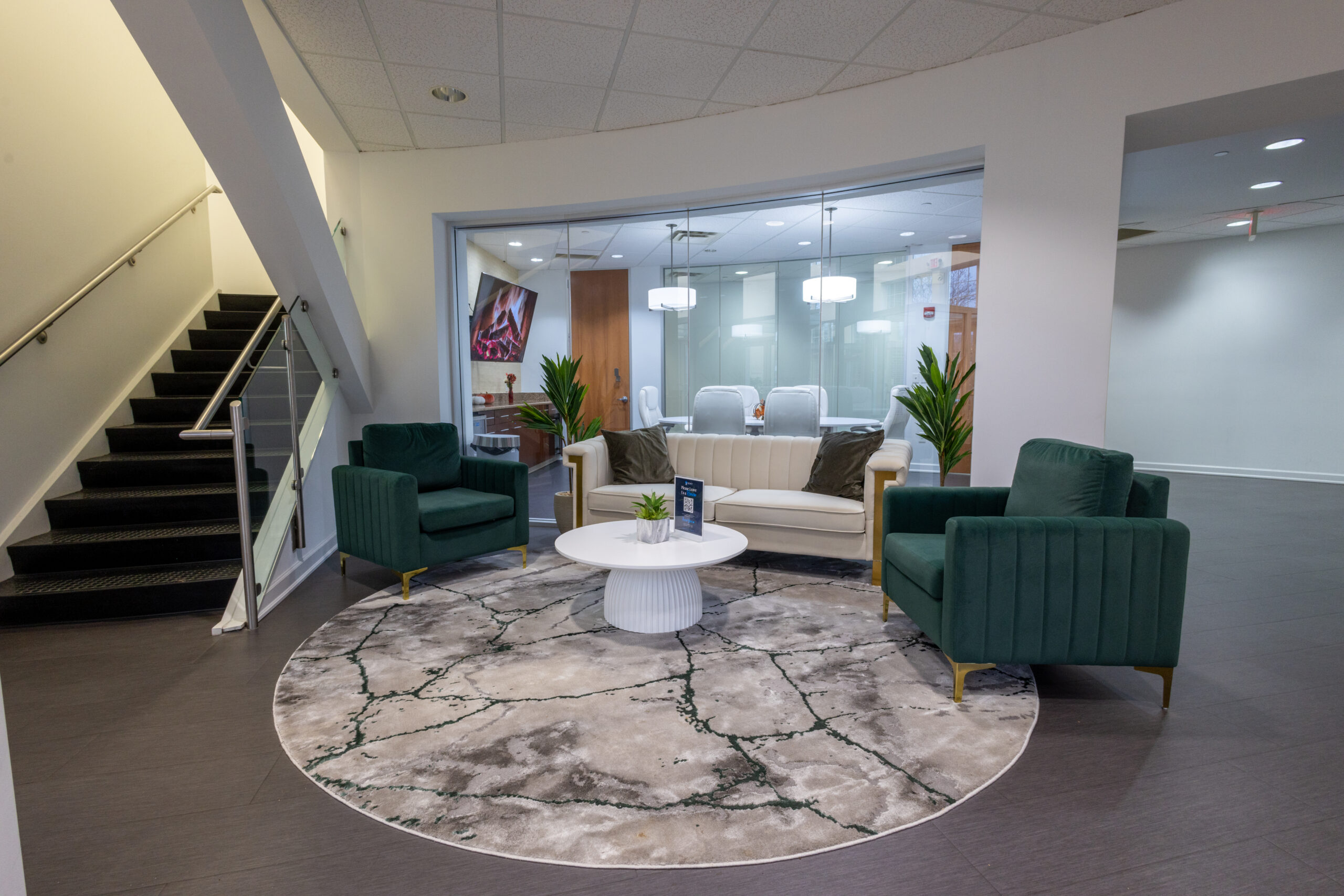 Outpatient Rehab Waiting Area Supporting Ongoing Recovery The image depicts a serene modern outpatient rehabilitation facility featuring a comfortable indoor seating area surrounded by modern accents, providing a tranquil environment for patients recovering from various conditions. This space is designed to enhance well-being and support therapy programs, fostering a sense of community and relaxation for individuals undergoing outpatient treatment.